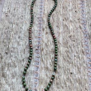 Strand of UNAKITE  BEADS 16”